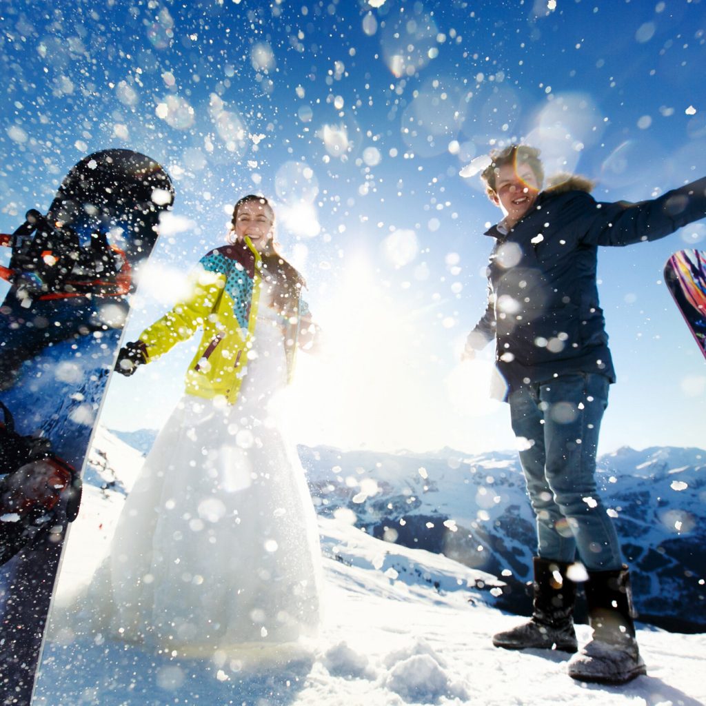 Turkey - A couple throwing snow at a ski resort